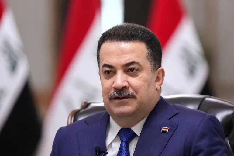 Iraq's Prime Minister Mohammed al-Sudani speaks during an interview with The Associated Press in Baghdad on Monday, July 28, 2025. (AP Photo/Hadi Mizban)