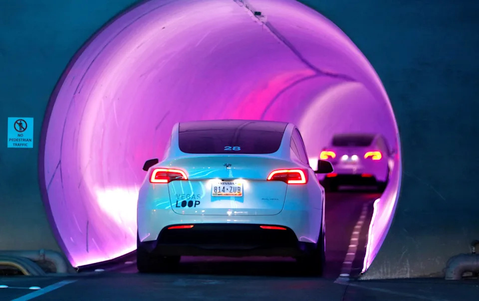Tesla electric cars ferry attendees to convention halls in underground tunnels called the Vegas Loop during CES 2023, an annual consumer electronics trade show, in Las Vegas in 2023.