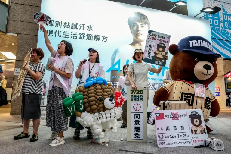 Supporters of a Taiwan recall vote shout 'Great recall, great success' in Taipei on July 22, 2025, ahead of recall elections this month (I-Hwa Cheng)