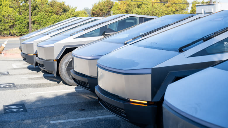 Line of multiple Tesla Cybertrucks at Tesla Motors dealership in Colma, California, December 6, 2024.
