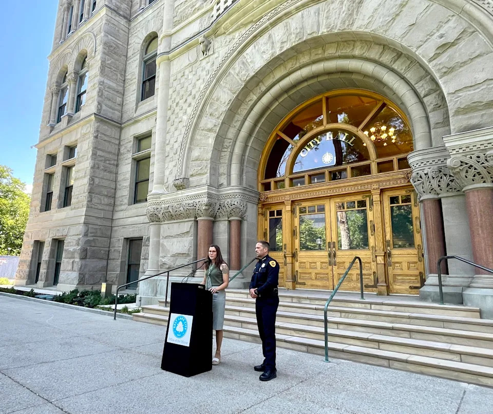 Salt Lake City Mayor Erin Mendenhall (left) and Salt Lake City Police Chief Brian Redd hold a news conference outside City Hall in Salt Lake City to urge the Utah Legislature to support more funding for homeless services on Aug. 13, 2025. (Katie McKellar/Utah News Dispatch)