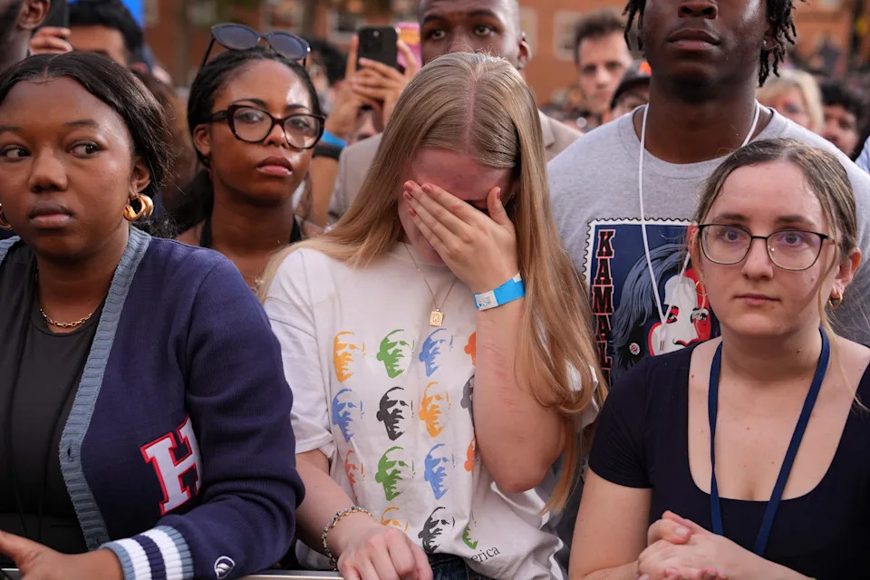 Supporters react as Democratic presidential nominee, U.S. Vice President Kamala Harris concedes the election during a speech at Howard University on November 06, 2024 in Washington, DC.