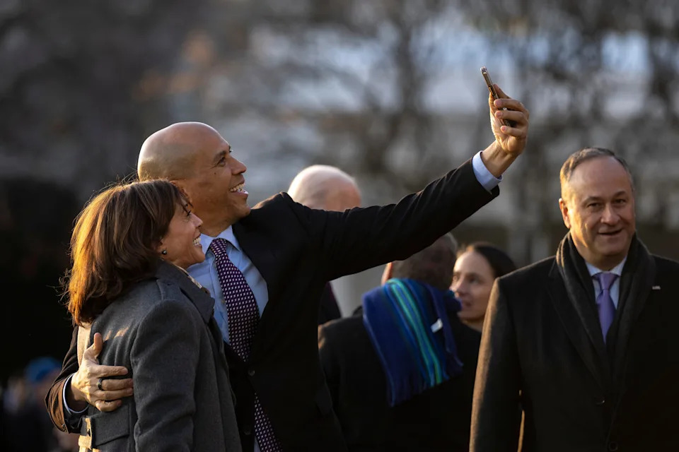Vice President Kamala Harris and Sen. Cory Booker (D-NJ) take a picture together during a signing ceremony for the Respect for Marriage Act on the South Lawn of the White House December 13, 2022 in Washington, DC.