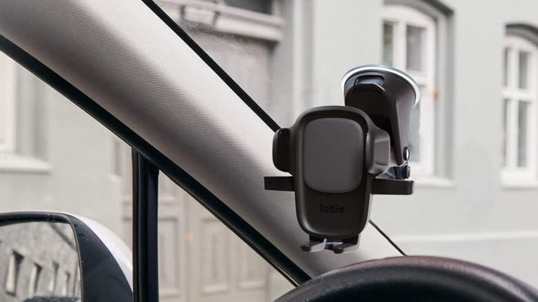 The iOttie Easy One Touch Universal Car Mount mounted to a windshield.