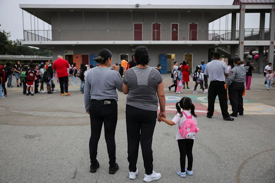 Immigrant families fear Trump's deportations as children return to school