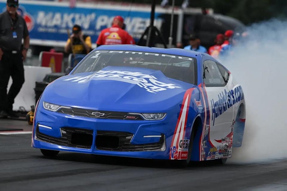 highperformance racing car in motion on a drag strip