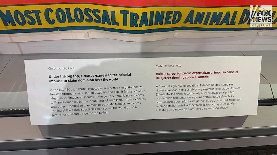 Smithsonian circus plaque describing colonial themes