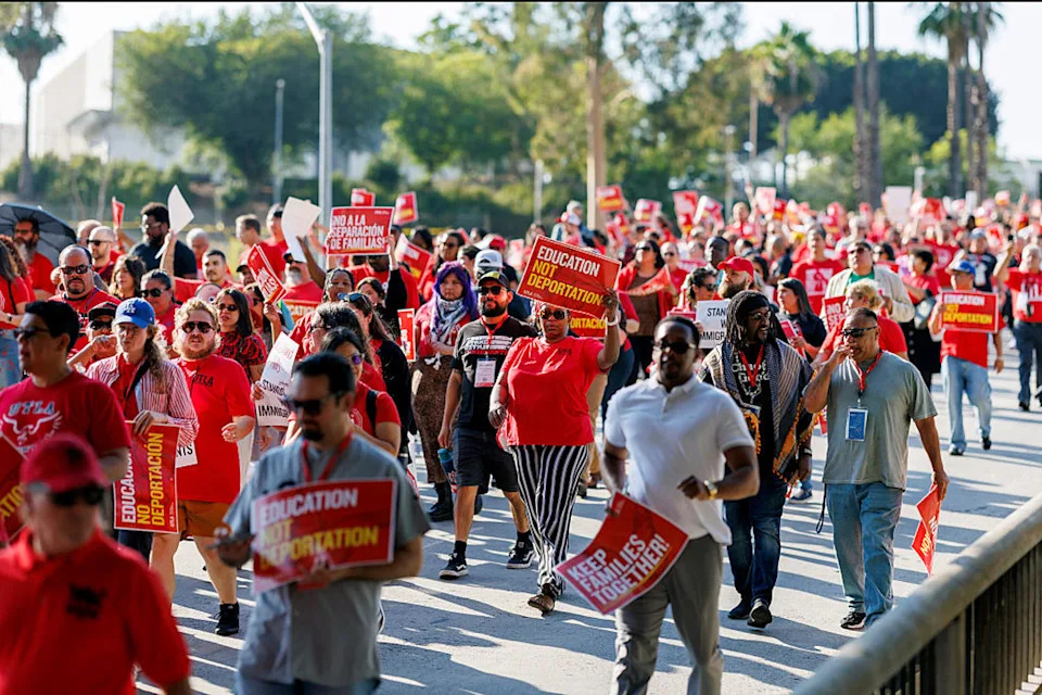 Hundreds of educators from UTLA march to "demand clear, proactive protocols that protect students and families from ICE and other federal agencies as the new school year begins on Aug. 2 in Los Angeles. (Gina Ferazzi / Los Angeles Times via Getty Images)