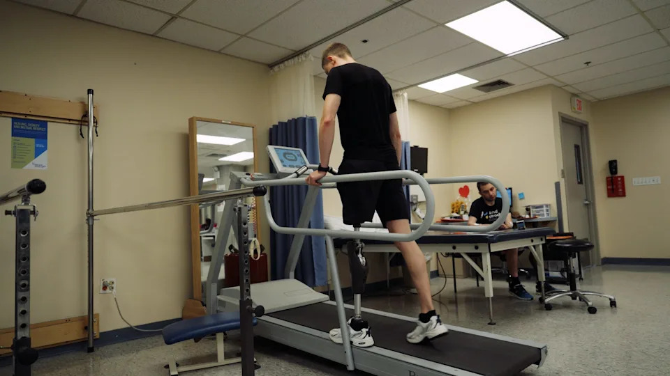 Yurii Saiko, a former Ukrainian marine, undergoes rehab after receiving a prosthetic leg at the Staten Island University Hospital in New York.