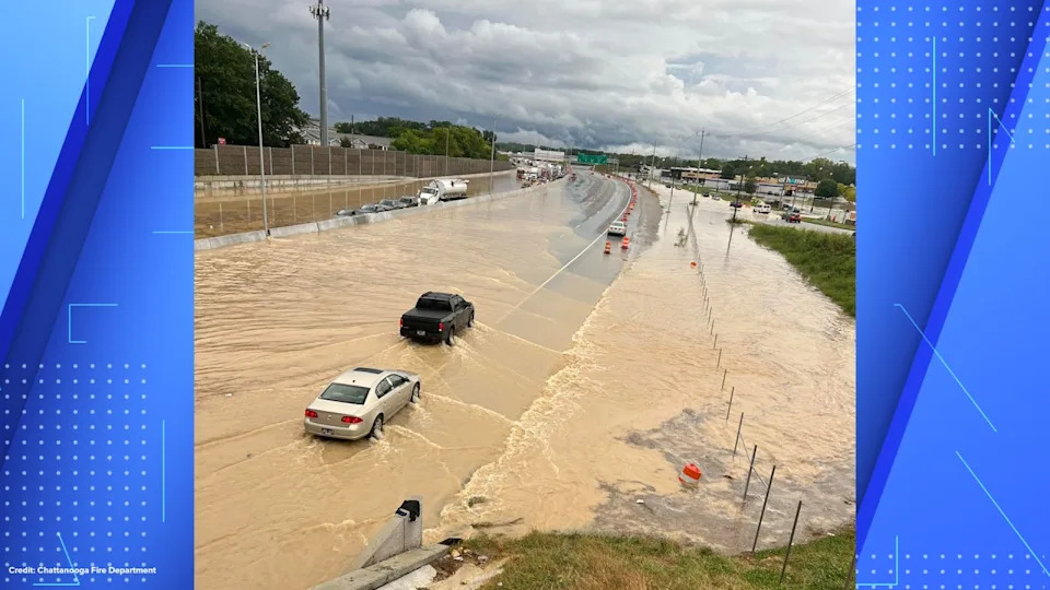 Cars drive through flooded highway in Chattanooga