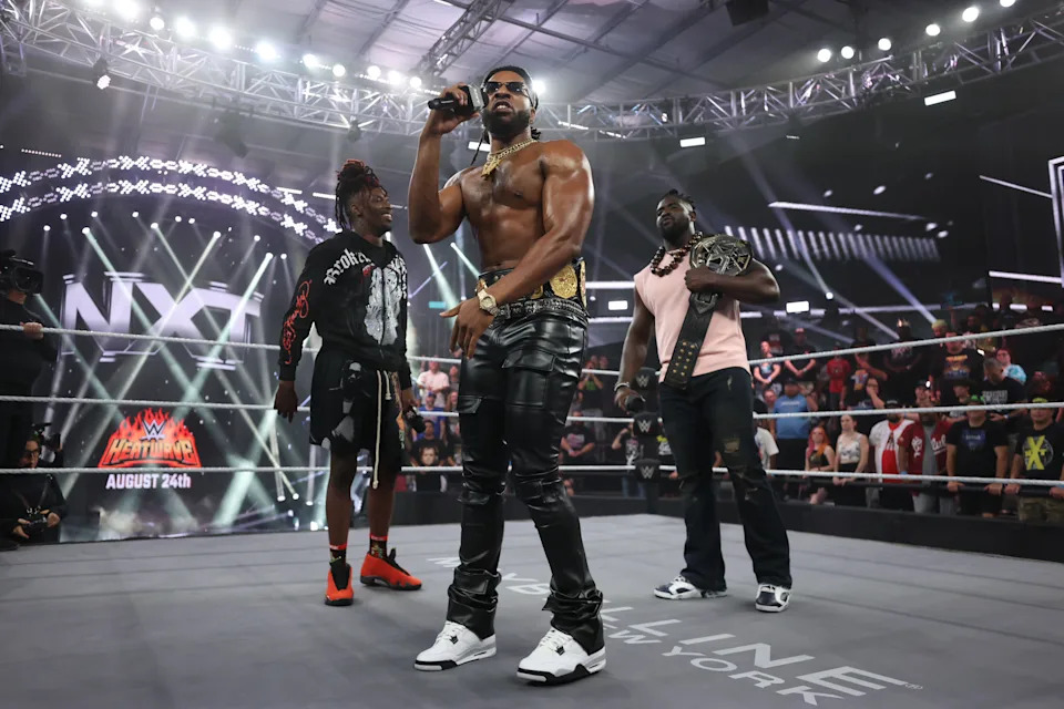 ORLANDO, FLORIDA - AUGUST 5: Je'Von Evans, Trick Williams, Oba Femi face off in the ring during NXT at the WWE Performance Center on August 5, 2025 in Orlando, Florida.  (Photo by Matt Pendleton/WWE Via Getty Images)