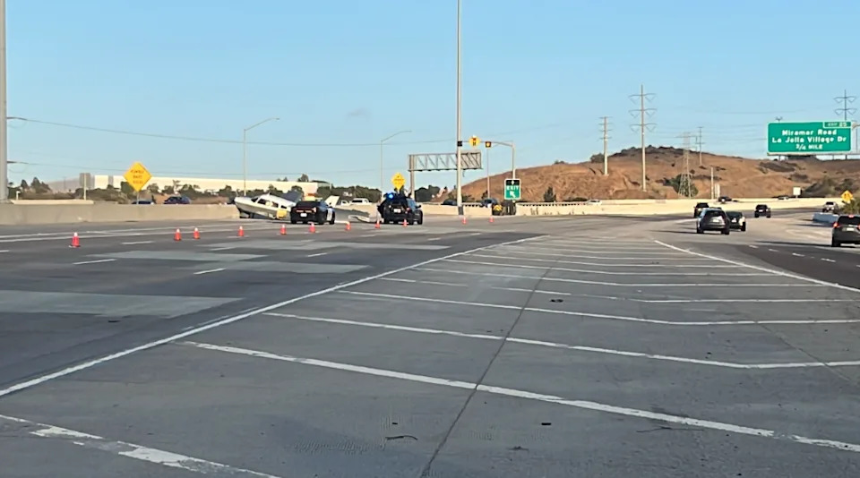 Small plane lands in middle of San Diego highway (FOX 5/KUSI)