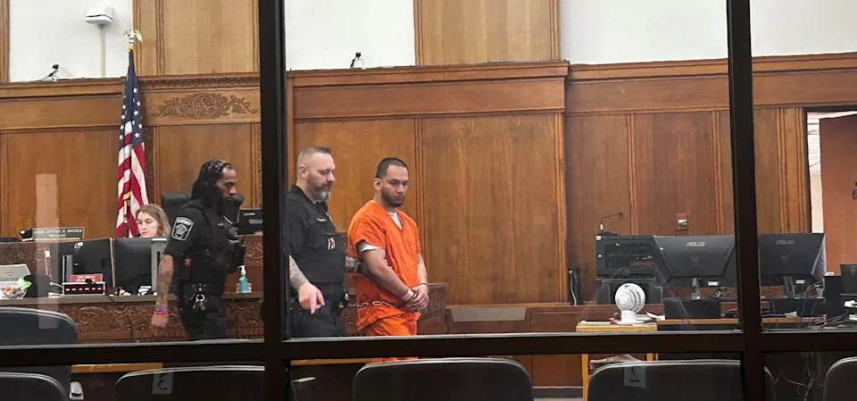Kevin Lopez arrives for his Milwaukee court hearing on May 15. Lopez is accused of sexually assaulting a woman and 14-year-old girl after a small gathering at an east side restaurant he co-owned. He was detained by federal immigration agents on May 7, complicating his local case.