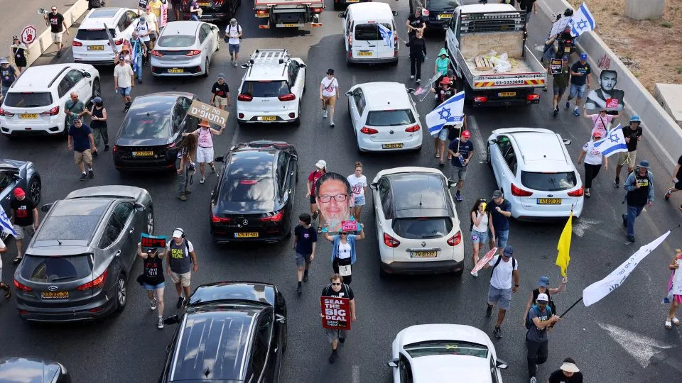 Protesters block the Ayalon access road to Tel Aviv in Israel on Sunday. - Tomer Appelbaum/Reuters