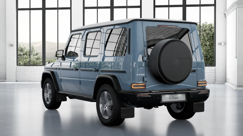 Rear 3/4 view of a blue Mercedes-Benz G-Class