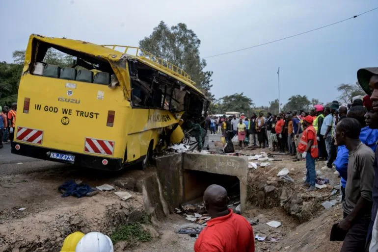 Bus carrying mourners overturns in Kenya, killing 21 people