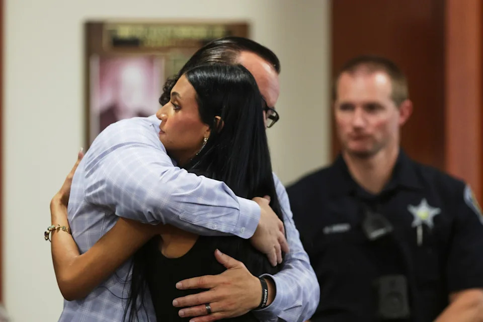 Kyle Green/Pool/Getty Images - PHOTO: Steve Goncalves, father of victim Kaylee Goncalves, hugs his daughter Alivea after speaking at the sentencing hearing of Bryan Kohberger at the Ada County Courthouse on July 23, 2025 in Boise, Idaho.