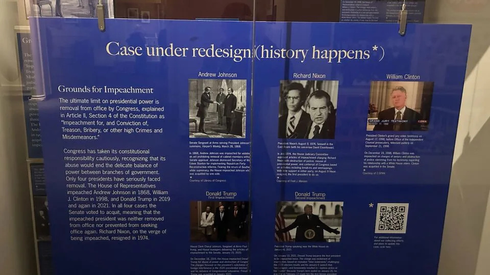 In September 2021, the Smithsonian placed a board over the exhibit which read: “Case under redesign (history happens*)” and referenced Trump’s two impeachments. - Michael Williams/CNN
