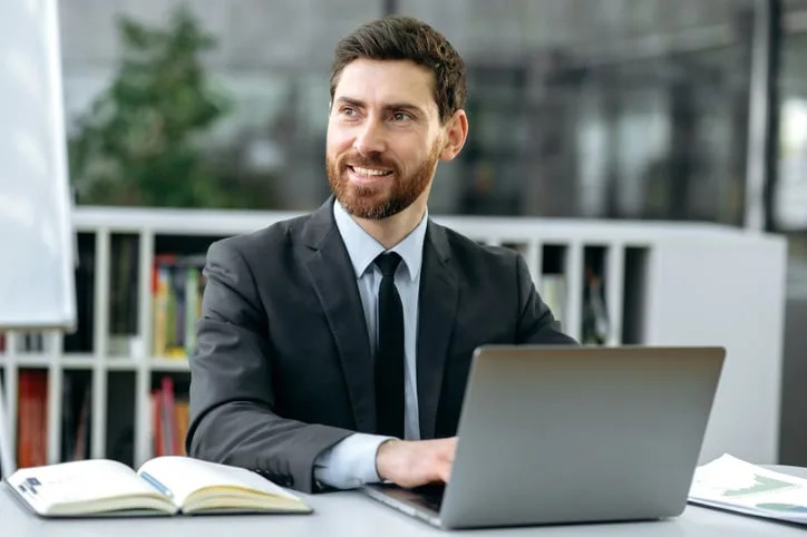 Businessman at his computer in office.