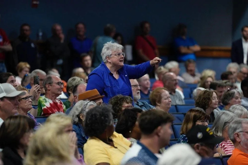Ohio GOP congressman Warren Davidson fields questions amid shouting at a lively town hall