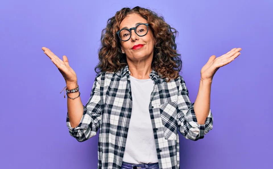 Woman questioning with her gesture.