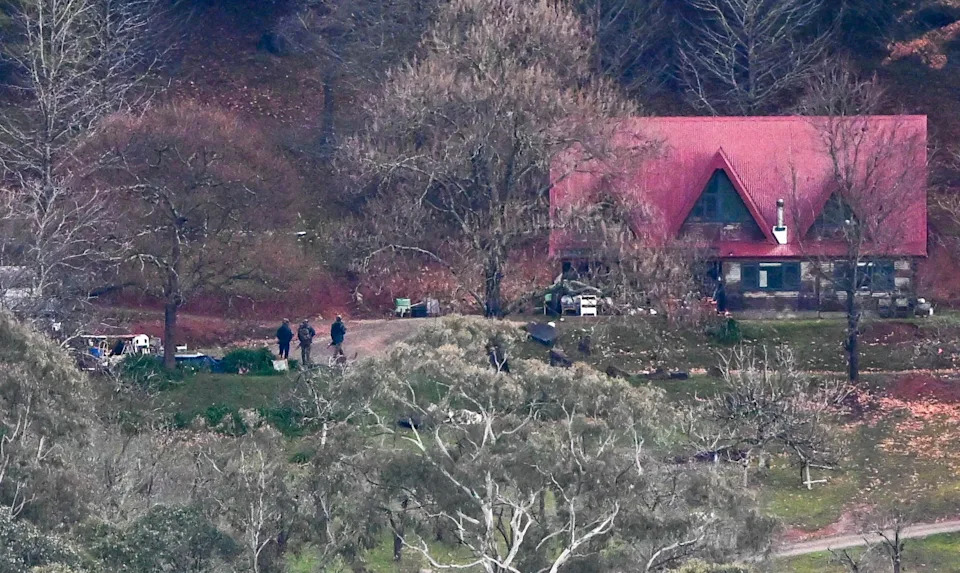 Manhunt continues for well-armed survivalist suspected of killing 2 cops
