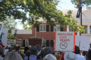 An anti-ICE protest sign near the Governor’s Mansion in Lincoln on Aug. 22, 2025. (Juan Salinas II/Nebraska Examiner)