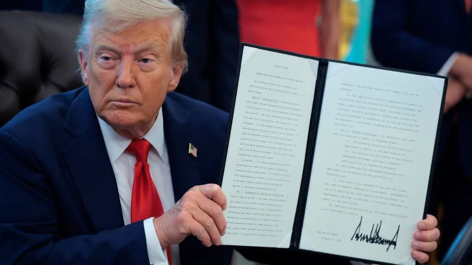 President Donald Trump signs executive orders in the Oval Office at the White House on August 25, 2025 in Washington, DC. - Chip Somodevilla/Getty Images