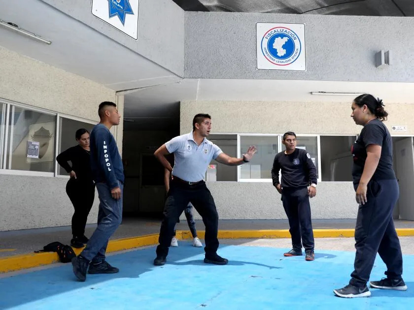 Cadets practice hand to hand combat.