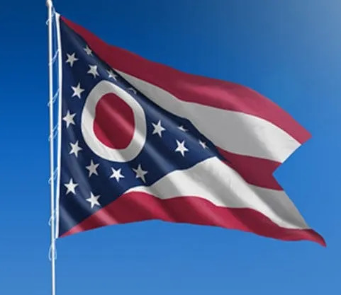 Why are flags being flown at half-staff in Ohio today?