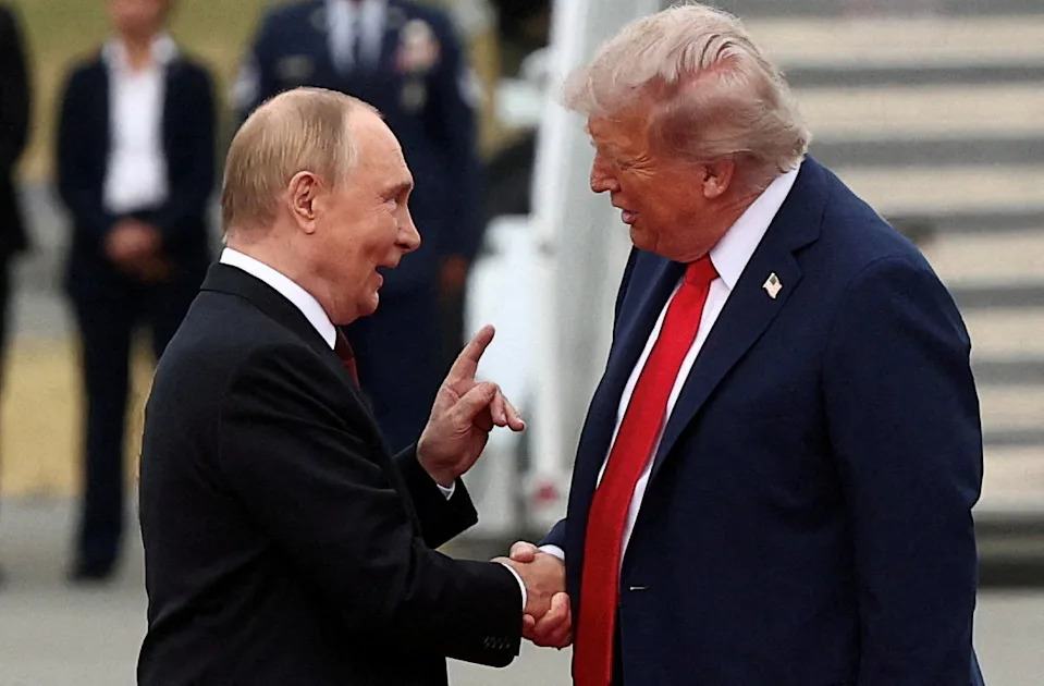 Putin and Trump shake hands during their Alaska meeting (REUTERS)
