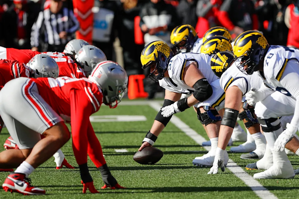 COLUMBUS, OH - NOVEMBER 30: Ohio State Buckeyes players line up opposite Michigan Wolverines players during the game against the Michigan Wolverines and the Ohio State Buckeyes on November 30, 2024, at Ohio Stadium in Columbus, OH. (Photo by Ian Johnson/Icon Sportswire via Getty Images)