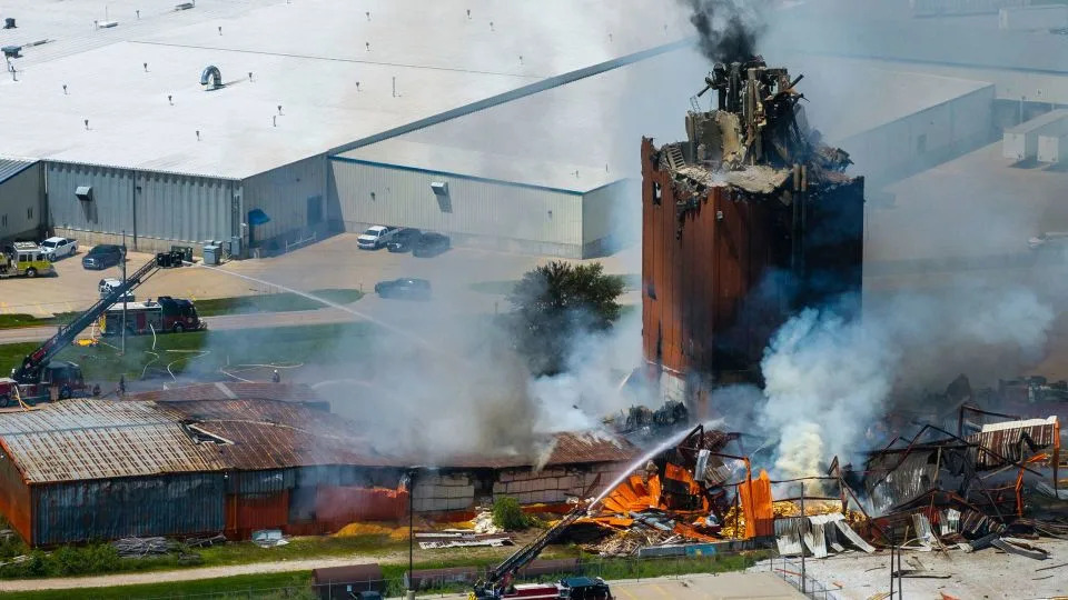 Firefighters battle a fire after an explosion in an industrial area in Fremont, Nebraska, on Tuesday. - Chris Machian/Omaha World-Herald/AP