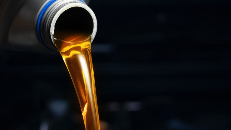 Motor oil pouring