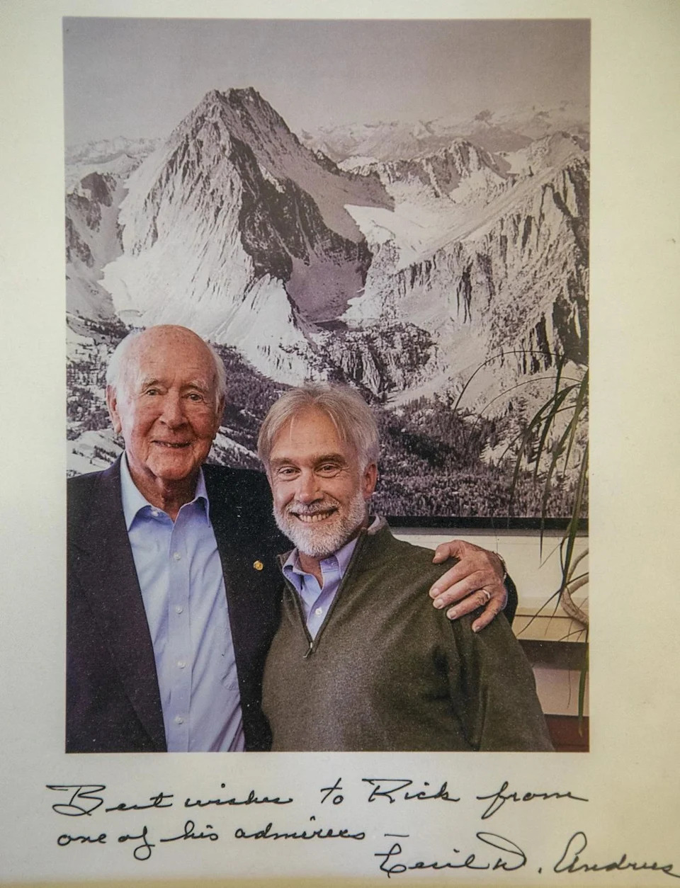 Photographer Ernie Day took the quinessential photograph of Castle Peak to show where a molybdenum mine was proposed at the mountain’s lap. The issue, which Democrat Cecil Andrus opposed, got him elected governor of Idaho in 1970. Rick Johnson, right, interviewed Andrus for a chapter in a book about Idaho wilderness, and shortly before Andrus died, they posed together in front of Day’s photo in the Idaho Conservation League office. The autographed image with Andrus is one of Johnson’s cherished possessions.