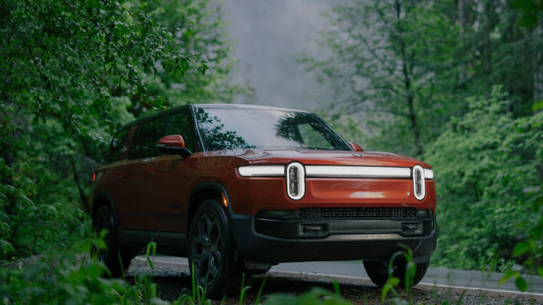 Rivian R1S in the woods