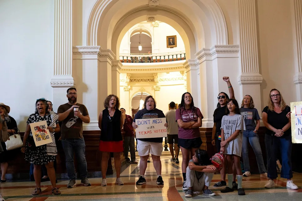Nuri Vallbona/Reuters - PHOTO: Protesters shout in support for State Rep. Nicole Collier, after she chose to remain in the Texas House chamber at the Texas State Capitol in Austin, Texas, August 19, 2025.