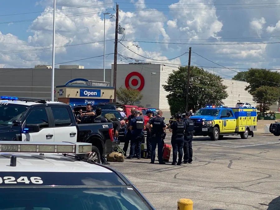 emwergency personnel in parking lot