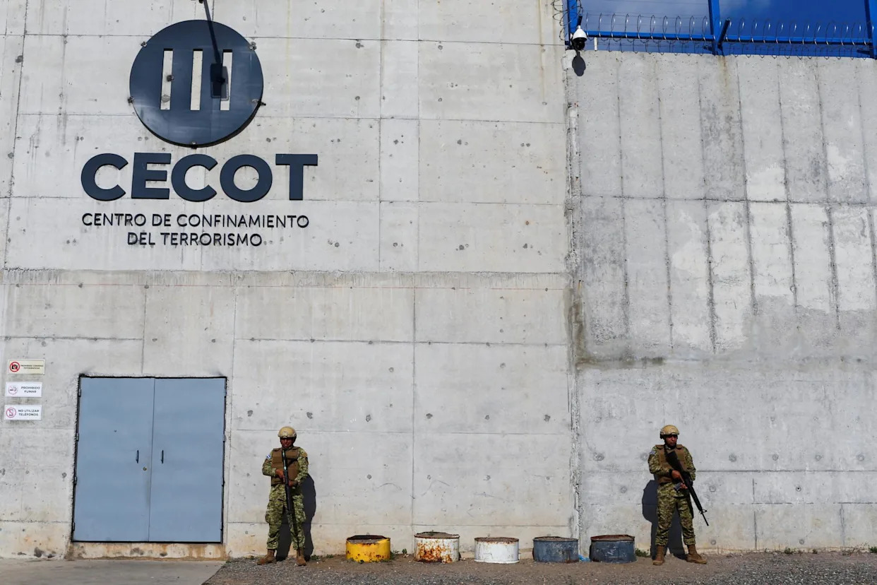 <span>Salvadorian soldiers stand guard, at the Cecot jail in Tecoluca.</span><span>Photograph: José Cabezas/Reuters</span>