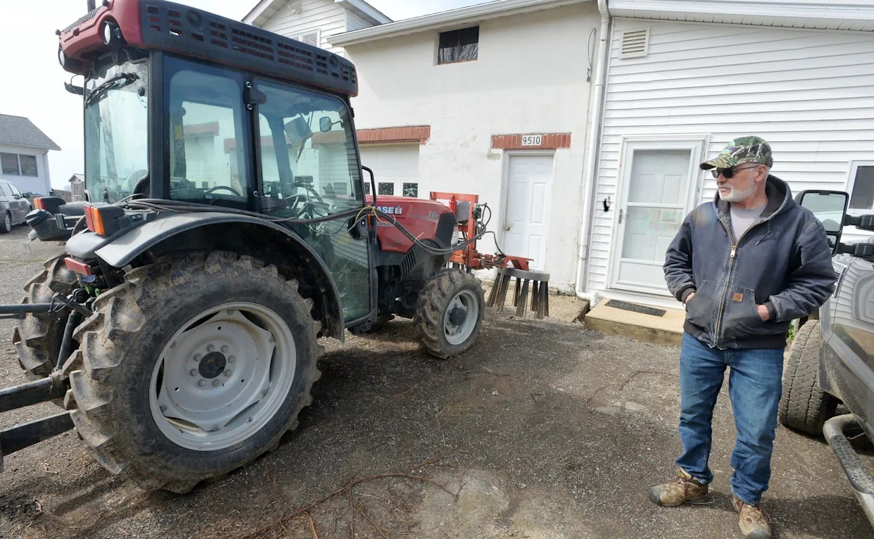 Half of farmers are over retirement age. How many farms are there in Illinois?