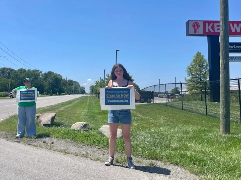 Hoosiers protest environmental deregulation plans outside an Indianapolis trucking facility on Tuesday, July 29, 2025. (Leslie Bonilla Muñiz/Indiana Capital Chronicle)