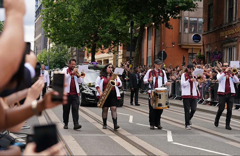 <p>Ozzy Osbourne's Funeral Procession</p>