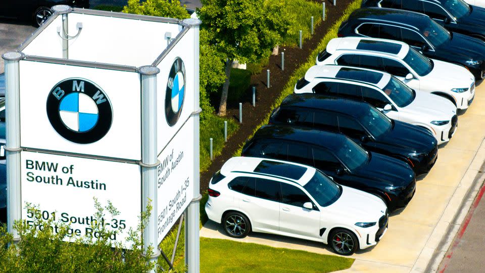 BMW vehicles are displayed for sale at the BMW dealership in Texas. Car prices, even for many import models, have largely stayed unchanged despite tariffs raising the costs for automakers. - Brandon Bell/Getty Images