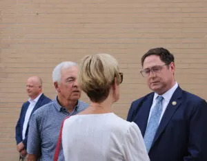  Nebaska U.S. Rep Mike Flood talking to attendees before his town hall in Lincoln on Aug 4, 2025. (Juan Salinas II/Nebraska Examiner)