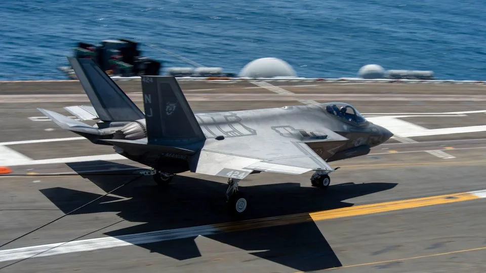 An F-35C, assigned to the “Rough Raiders” of Strike Fighter Squadron VFA-125, lands on the flight deck of the aircraft carrier USS Theodore Roosevelt on May 5, 2023. - Petty Officer 3rd Class Carter Radke/US Navy