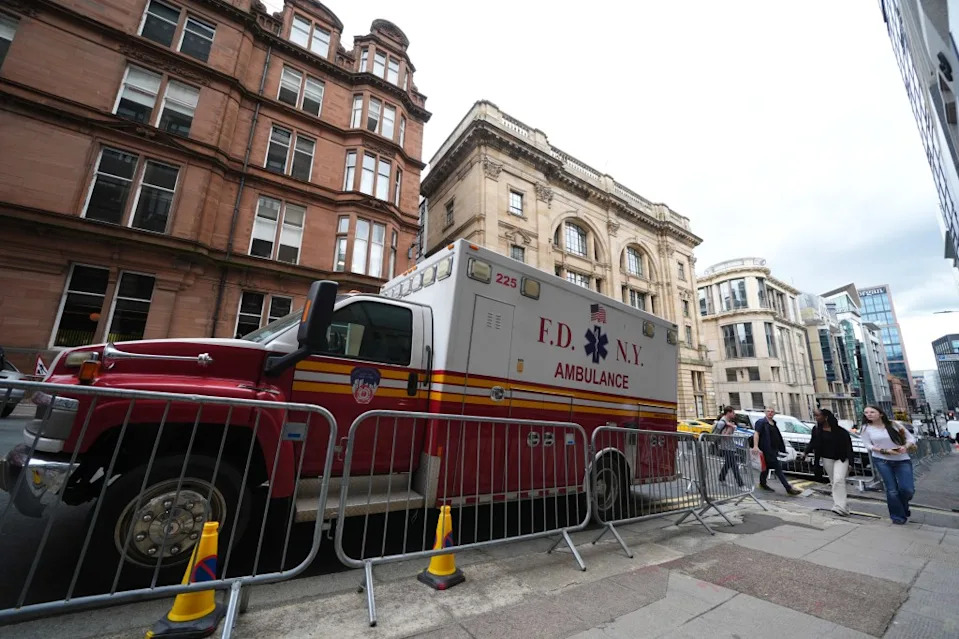 Extras acting as NYC locals were pictured on set rushing past FDNY ambulances and USPS trucks. ZUMAPRESS.com