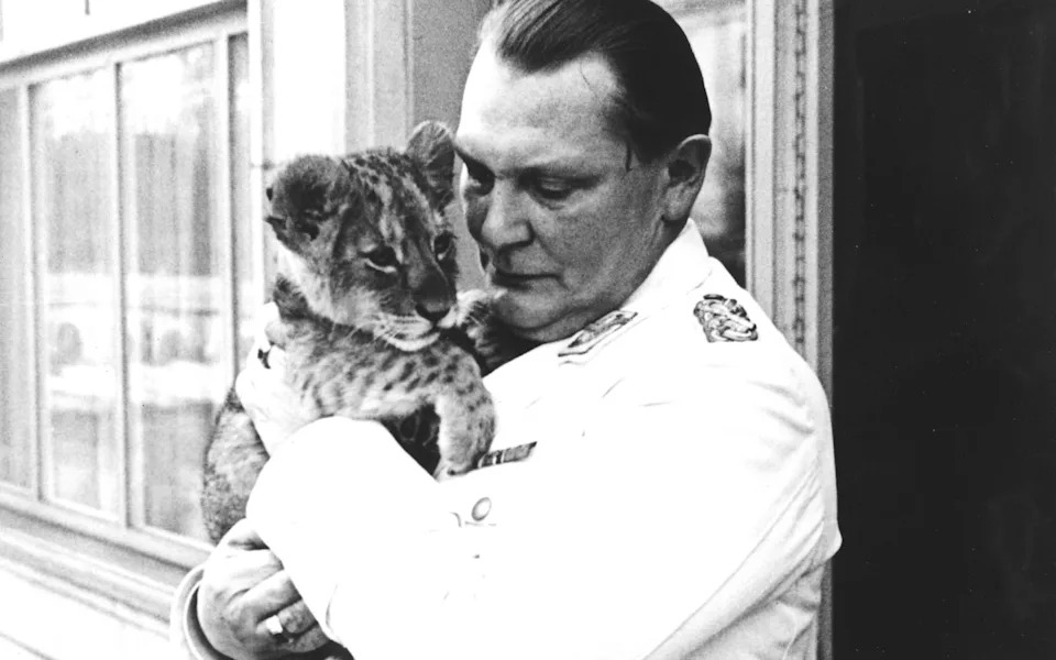 Nazi leader Hermann Goering with one of his pet lion cubs
