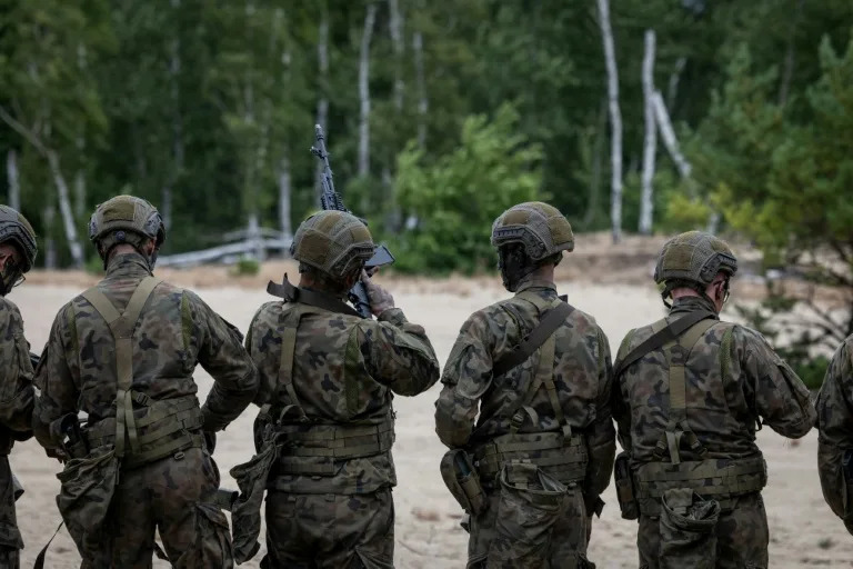 Poland launched a volunteer military training scheme to promote army service among young people as Poland beefs up its security (Wojtek RADWANSKI)