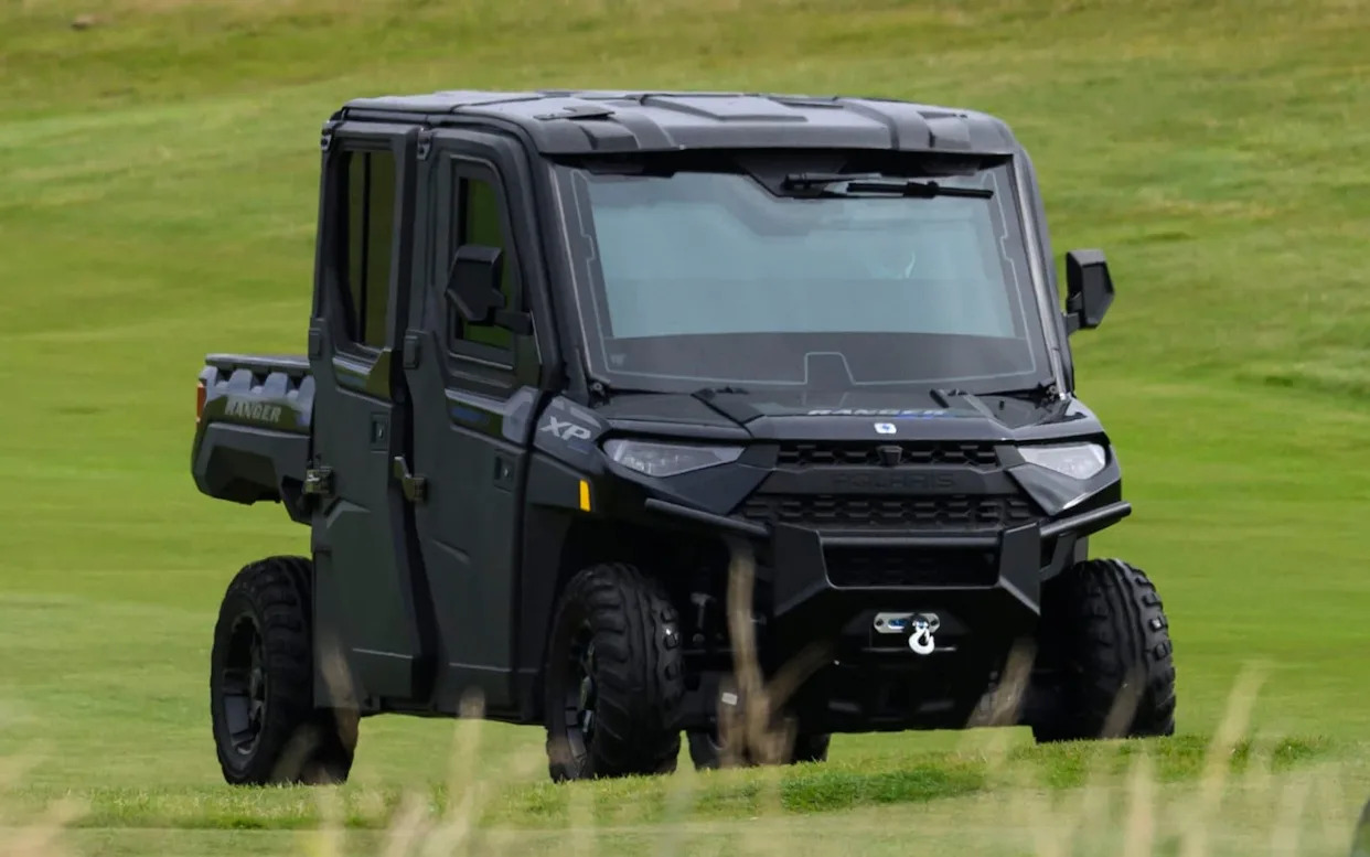 The armoured golf buggy appears to be a new addition to the Donald Trump&#39;s security fleet