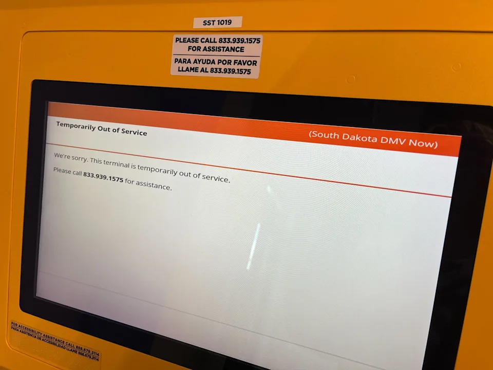 A South Dakota Department of Motor Vehicles kiosk screen says the machine is out of service on Tuesday, Aug. 19, 2025. The failure is part of a statewide government network outage. (Makenzie Huber/South Dakota Searchlight)